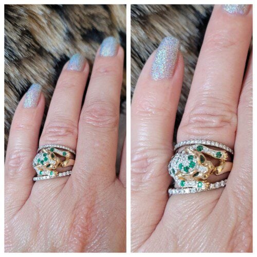 Diamond and emerald panthere ring on a hand with sparkly nails
