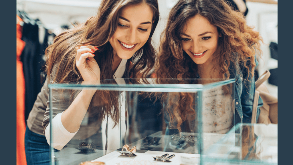 2 women earring shopping