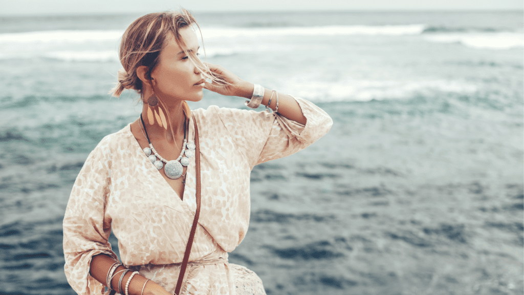 woman wearing jewelry at the beach