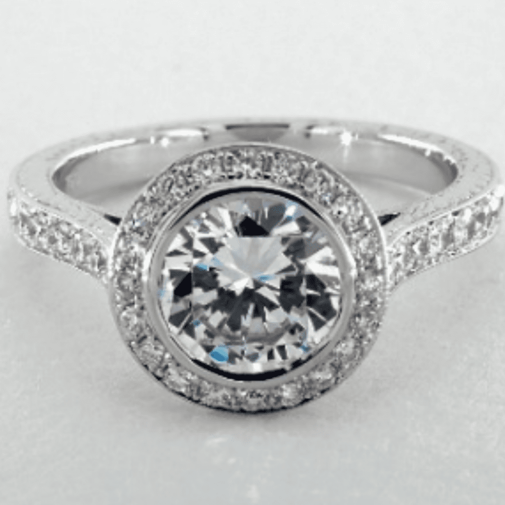 Platinum Hand Engraved Bezel Set Halo Pavé Engagement Ring at James Allen.