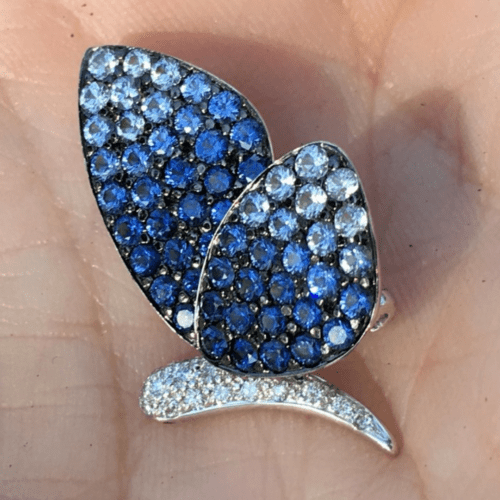 Graduated sapphire and diamond brooch