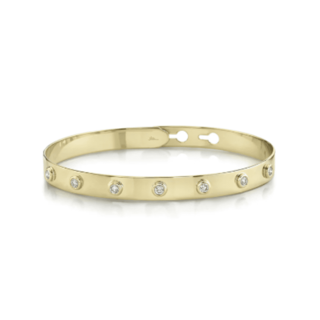 14kt Yellow Gold High Polish Latch Lock Bangle with 7 Bezel Set Diamonds from Continental Diamonds.