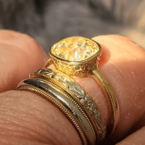 Old Mine Cut Diamond Ring in an engraved setting
