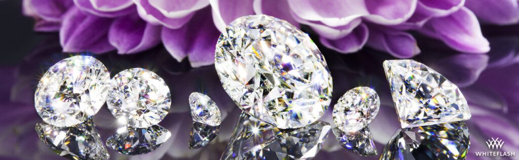 Different size carat diamonds on display