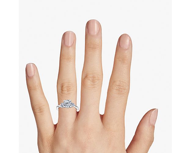 Wrapped Shank Three Stone Diamond Engagement Ring In Platinum