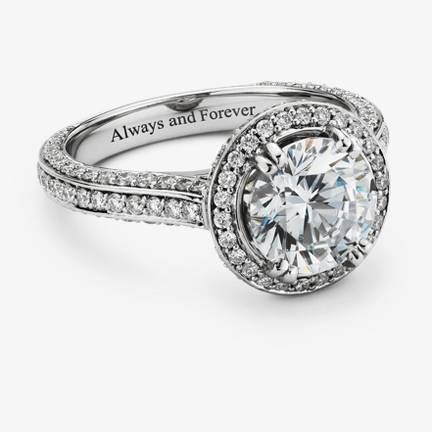 Similar design found : Twisted Band Halo Diamond Engagement Ring In Platinum (1/3 Ct. Tw.) at Blue Nile
