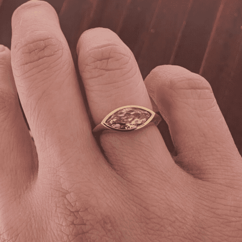 East-west yellow brown diamond ring